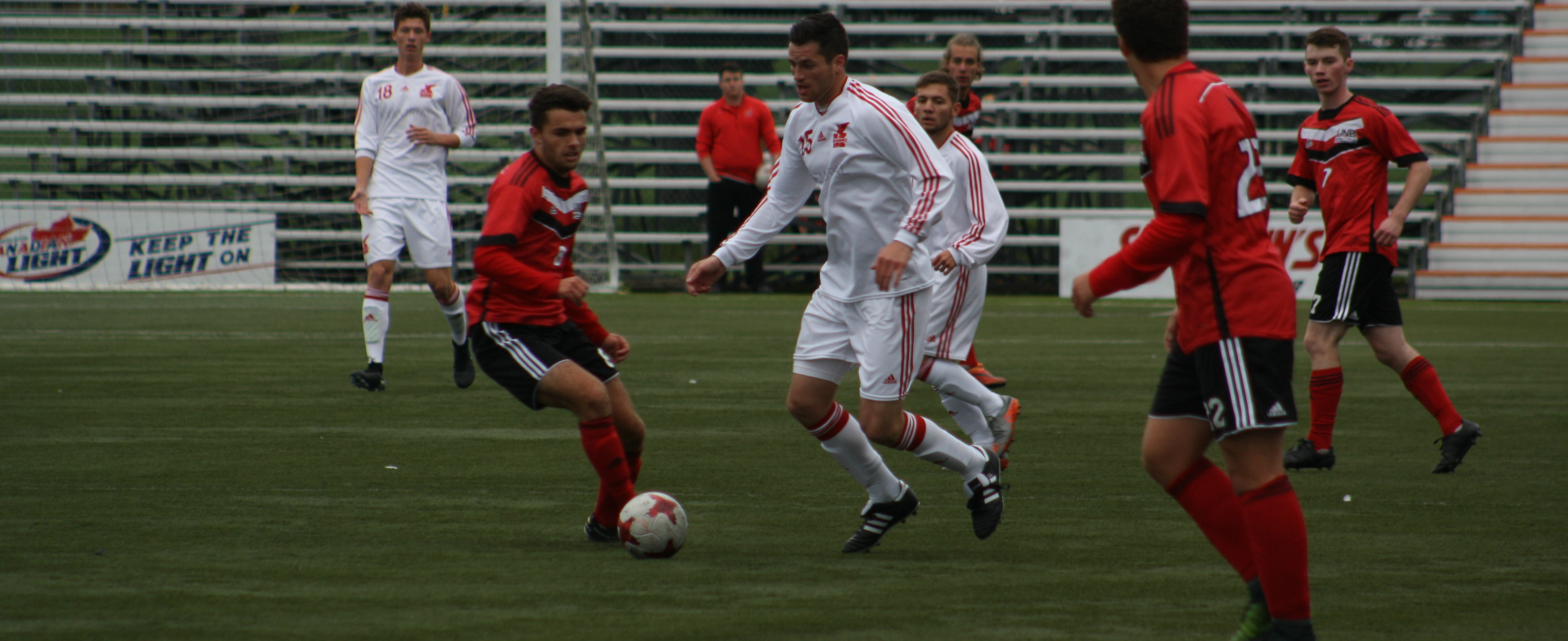Varsity Reds Find Scoring Touch Versus Hawks